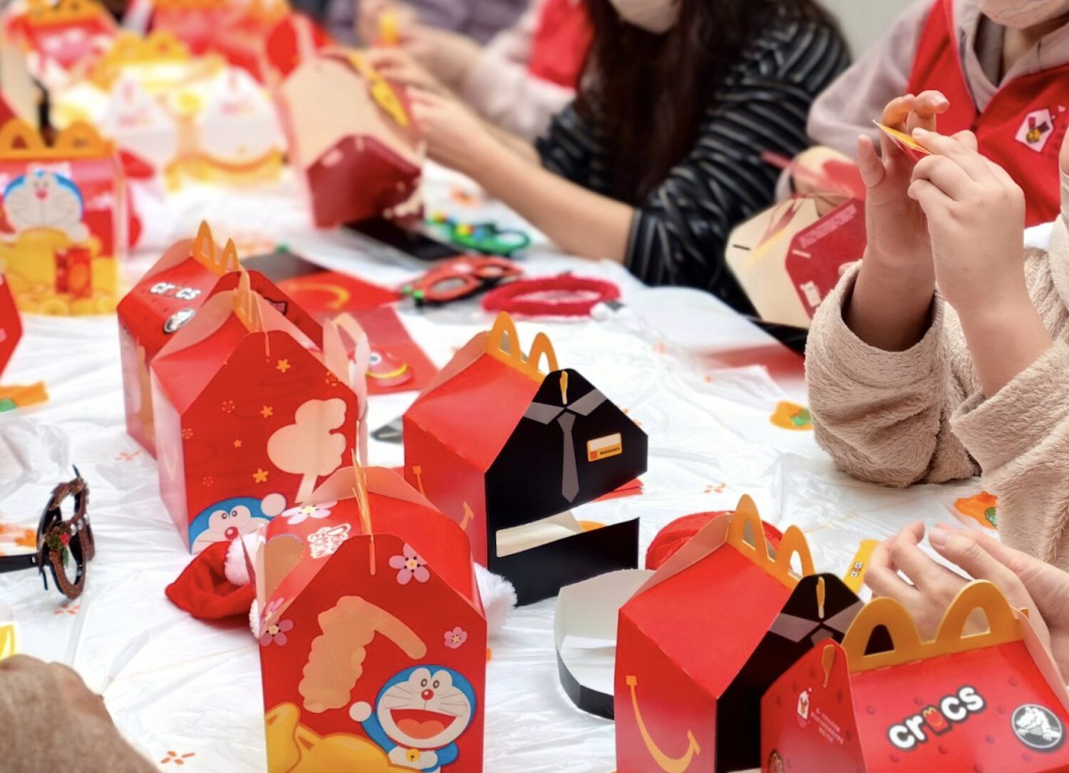 RMHC attendees making custom happy meal boxes